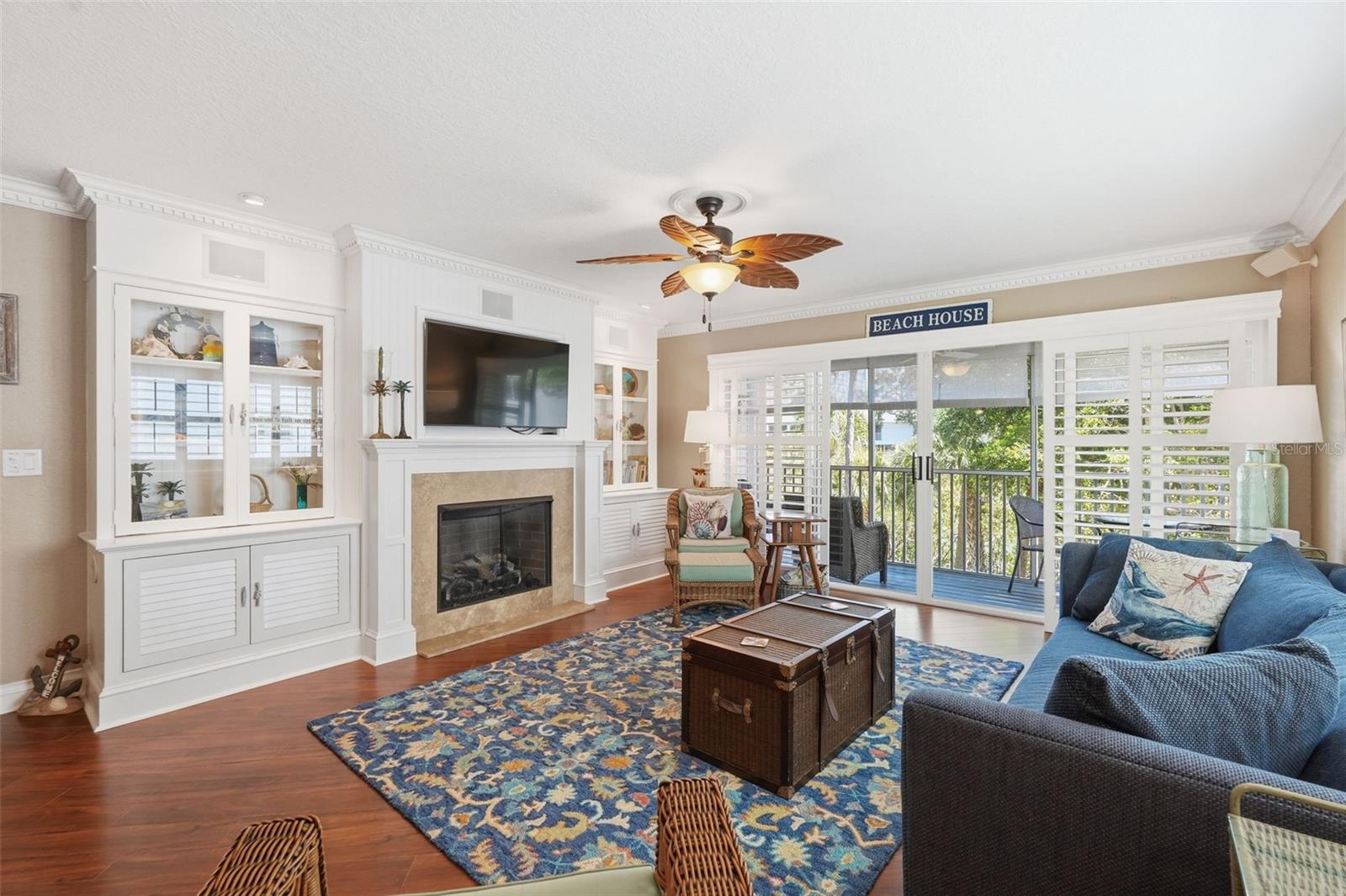 Gas Fireplace with built-in Display cabinets.  Crown molding throughout the home.
