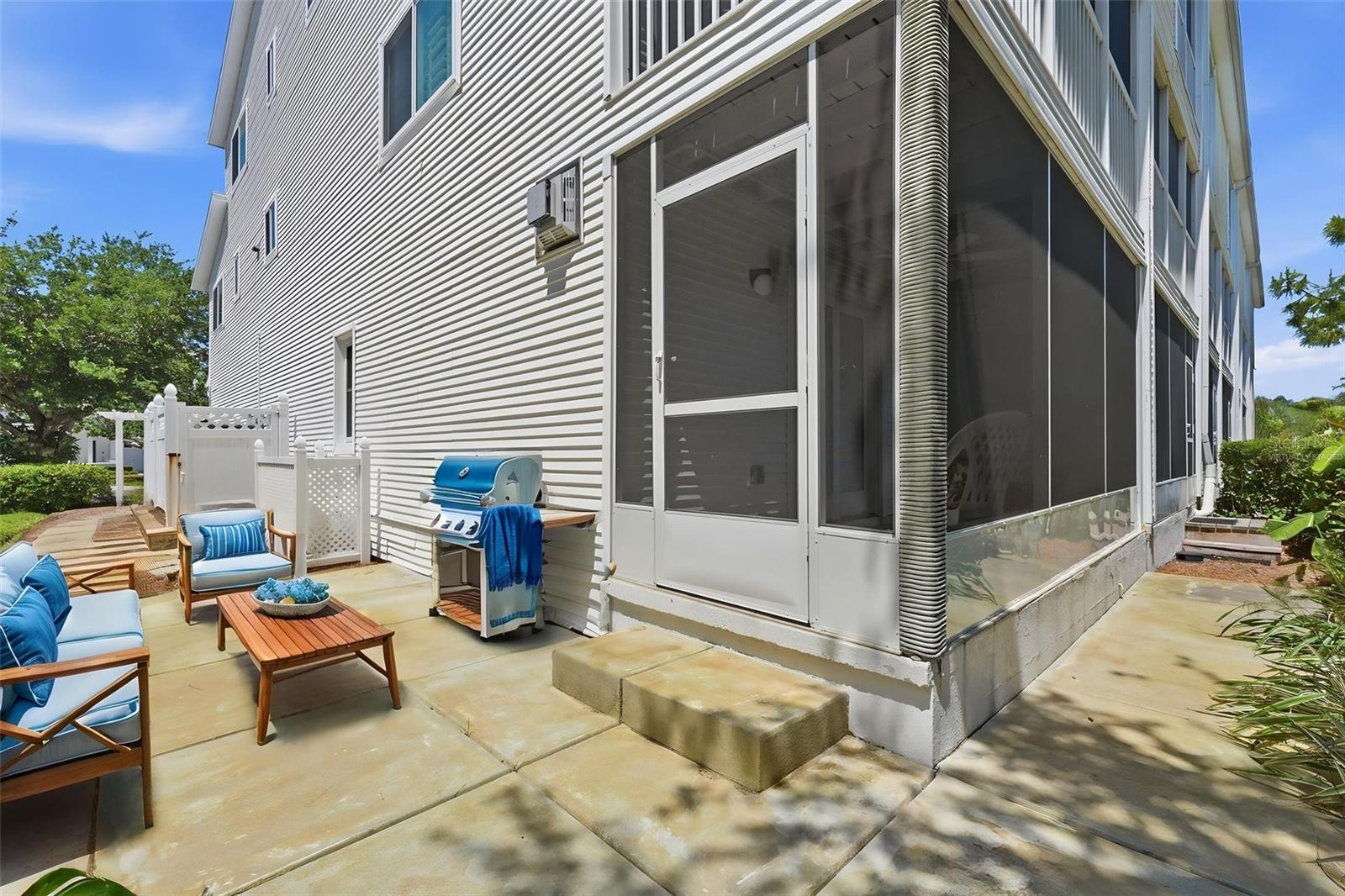 Virtually staged side concrete patio
