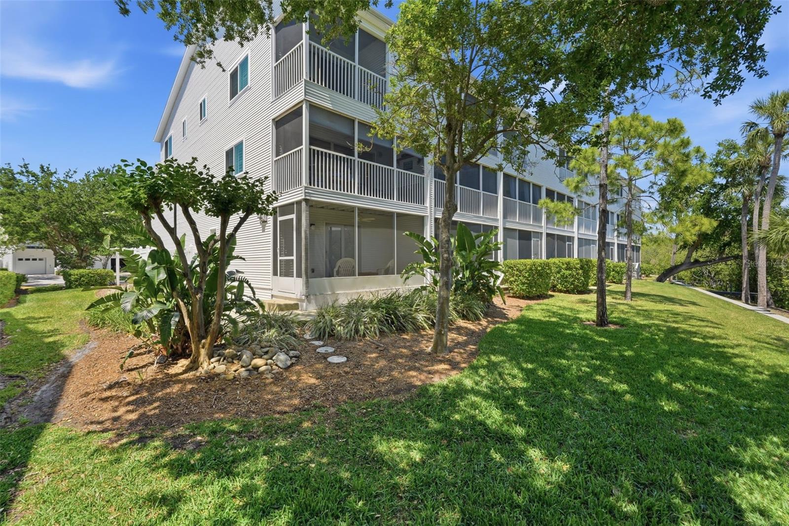 Tranquil Green space behind the townhome.