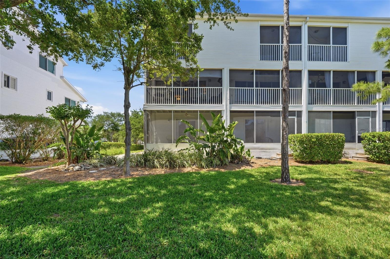 Tranquil Green space behind the townhome.