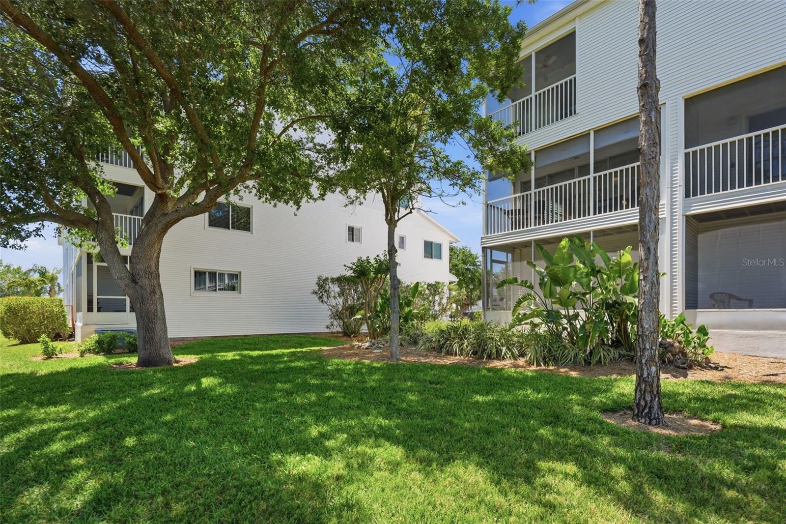 Tranquil Green space behind the townhome.