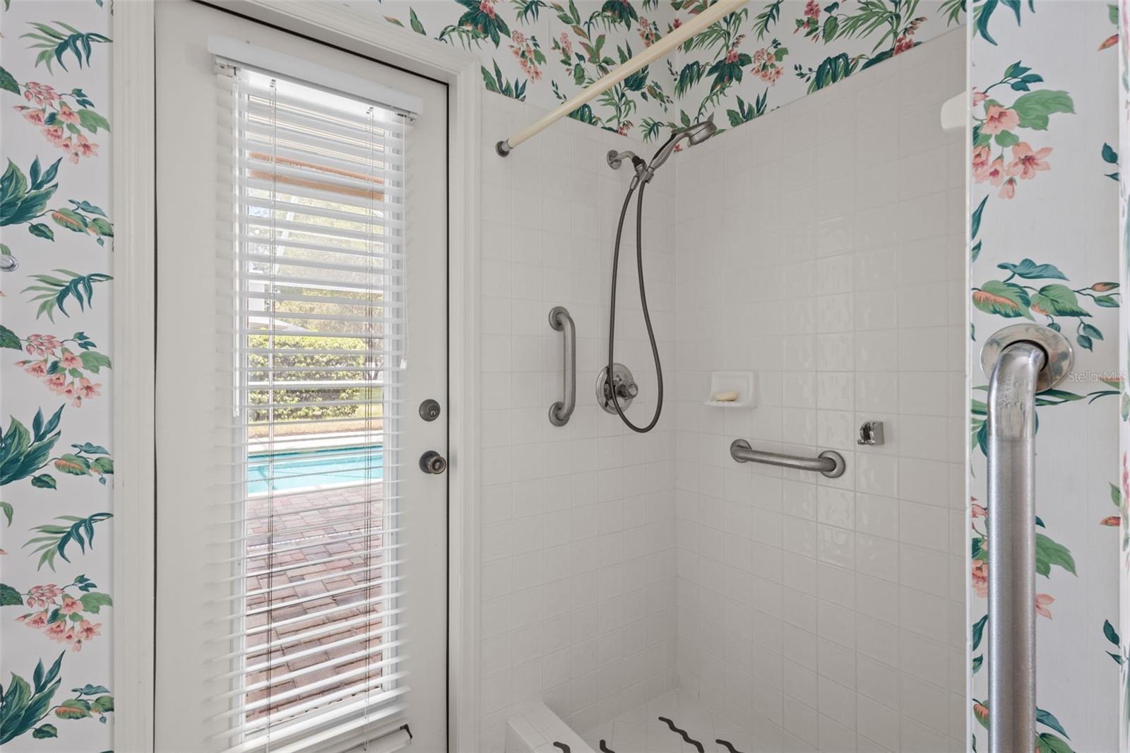 Bathroom 3 - has shower and serves as a pool bath with a door leading outside
