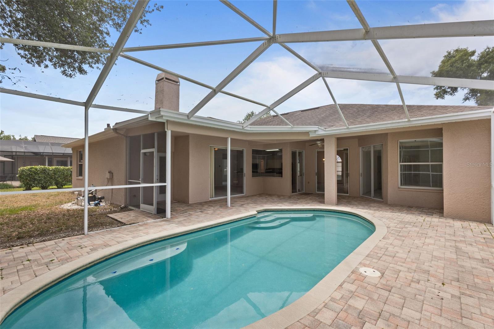 Private pool with screened enclosure.