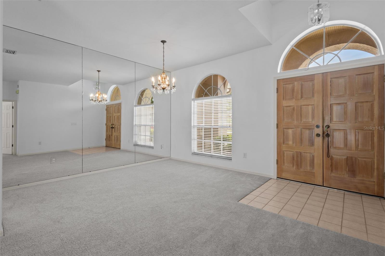 Entry opens directly into the great room with views of the pool and conservation