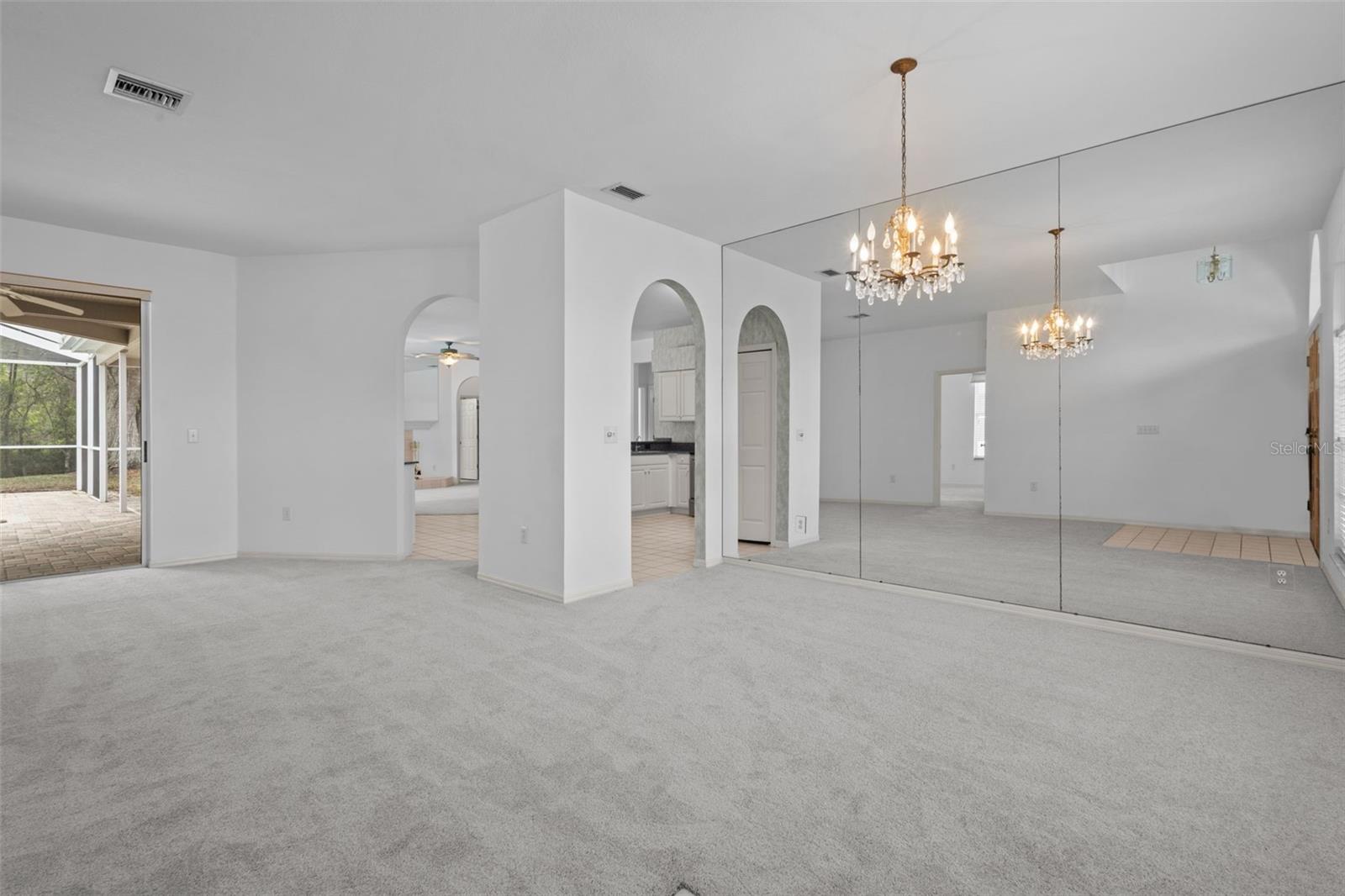 Entry opens directly into the great room with views of the pool and conservation