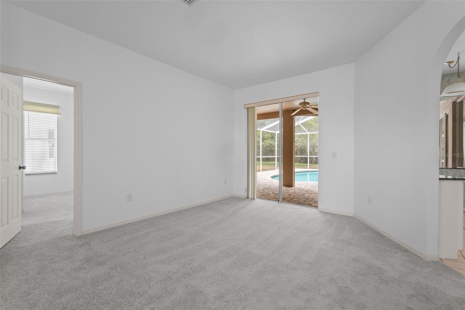 Entry opens directly into the great room with views of the pool and conservation