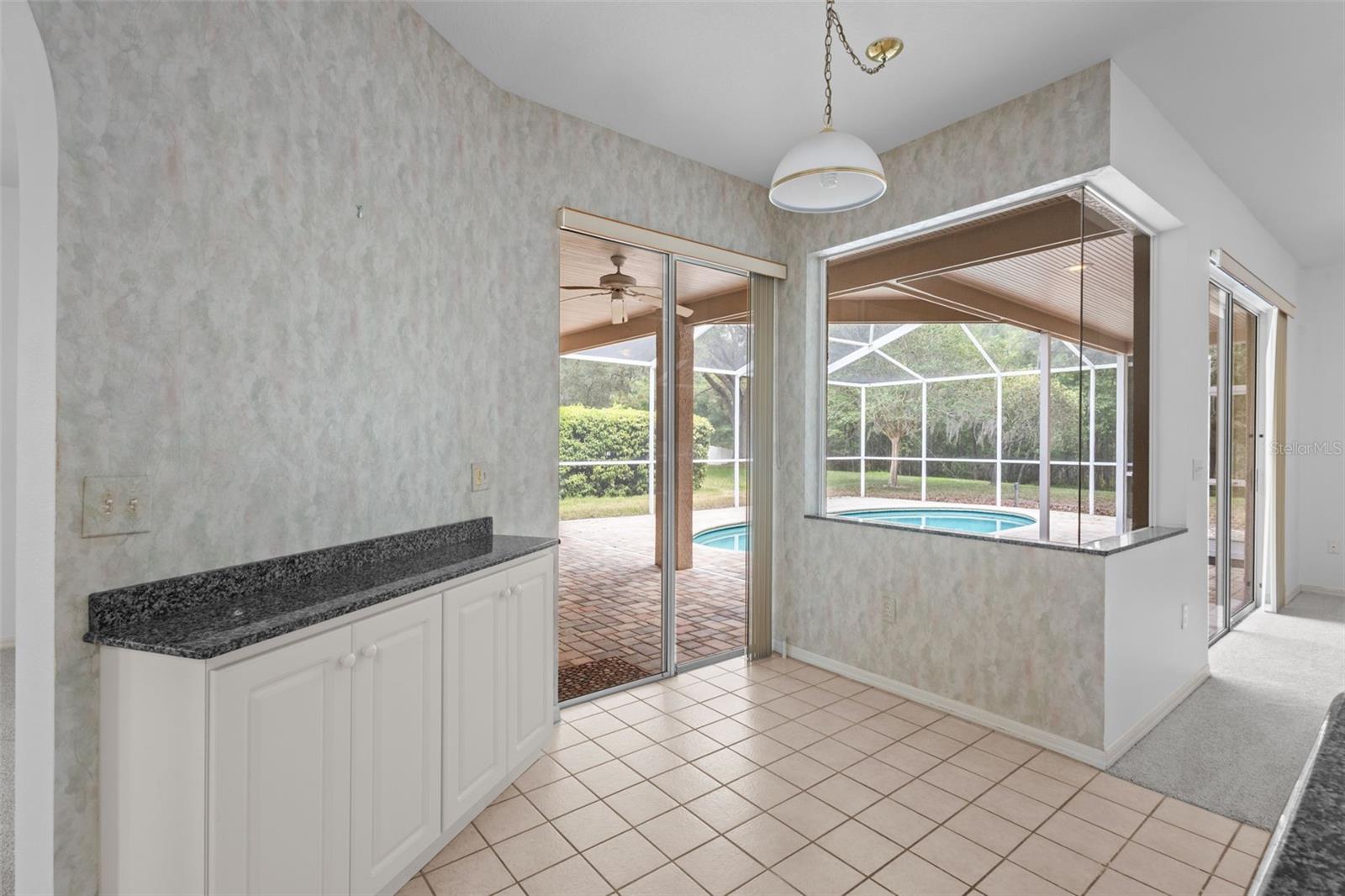 Adjacent breakfast nook with outdoor access