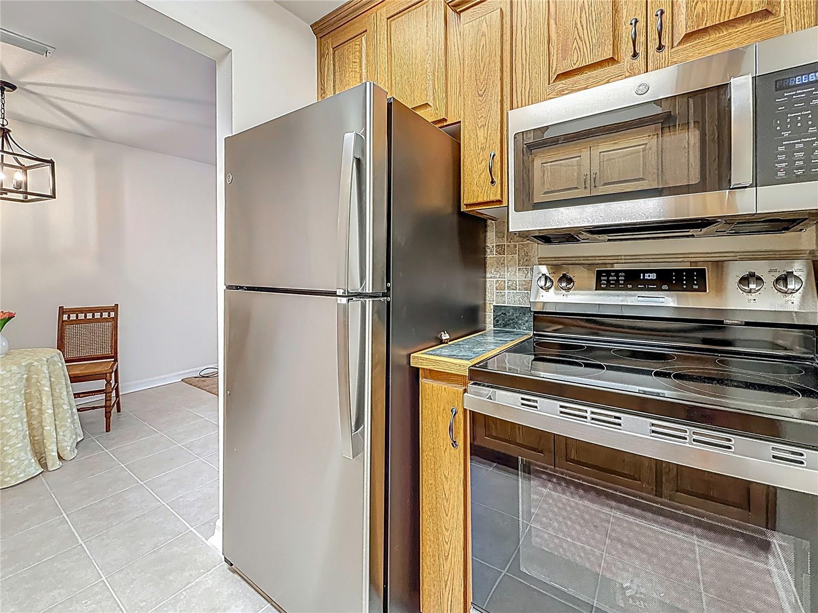 2442 Enterprise Rd no 6, kitchen, range, microwave, refrigerator, new stainless steel