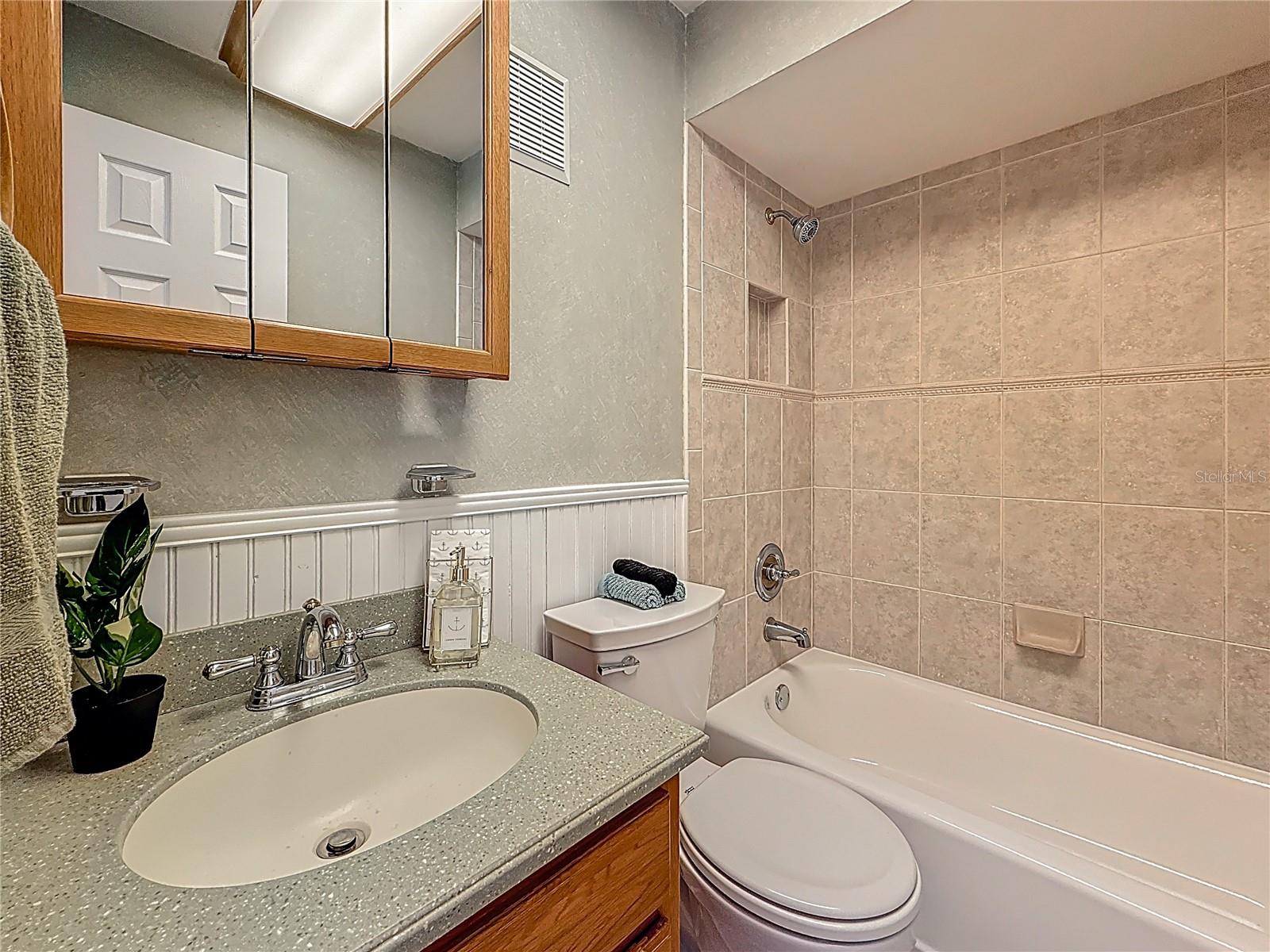 2442 Enterprise Rd no 6, bathroom, new tile, tub, cabinetry