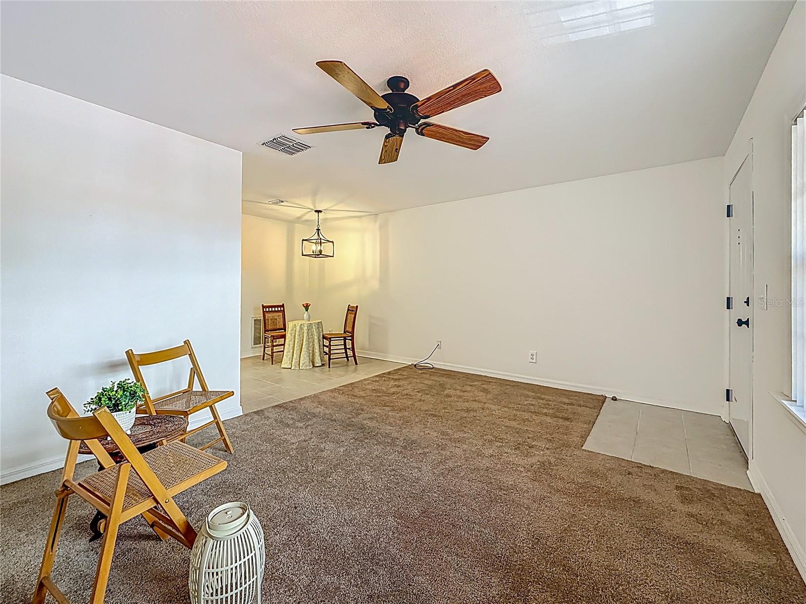 2442 Enterprise Rd no 6, living area, shows tile landing inside entry door