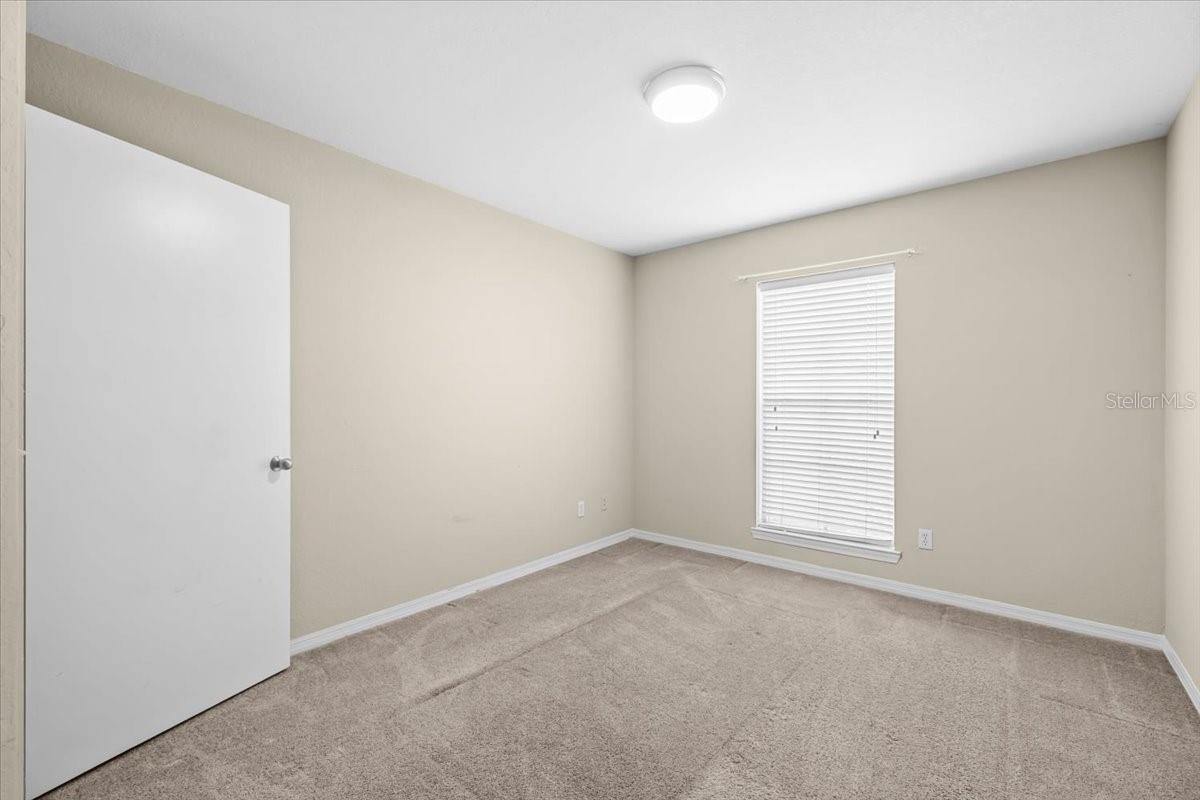 3rd bedroom with walk in closet