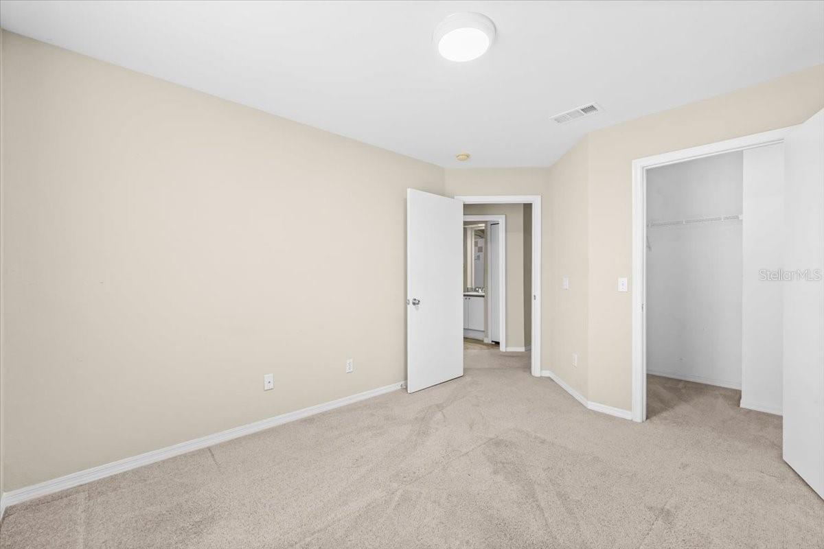 3rd bedroom with walk in closet