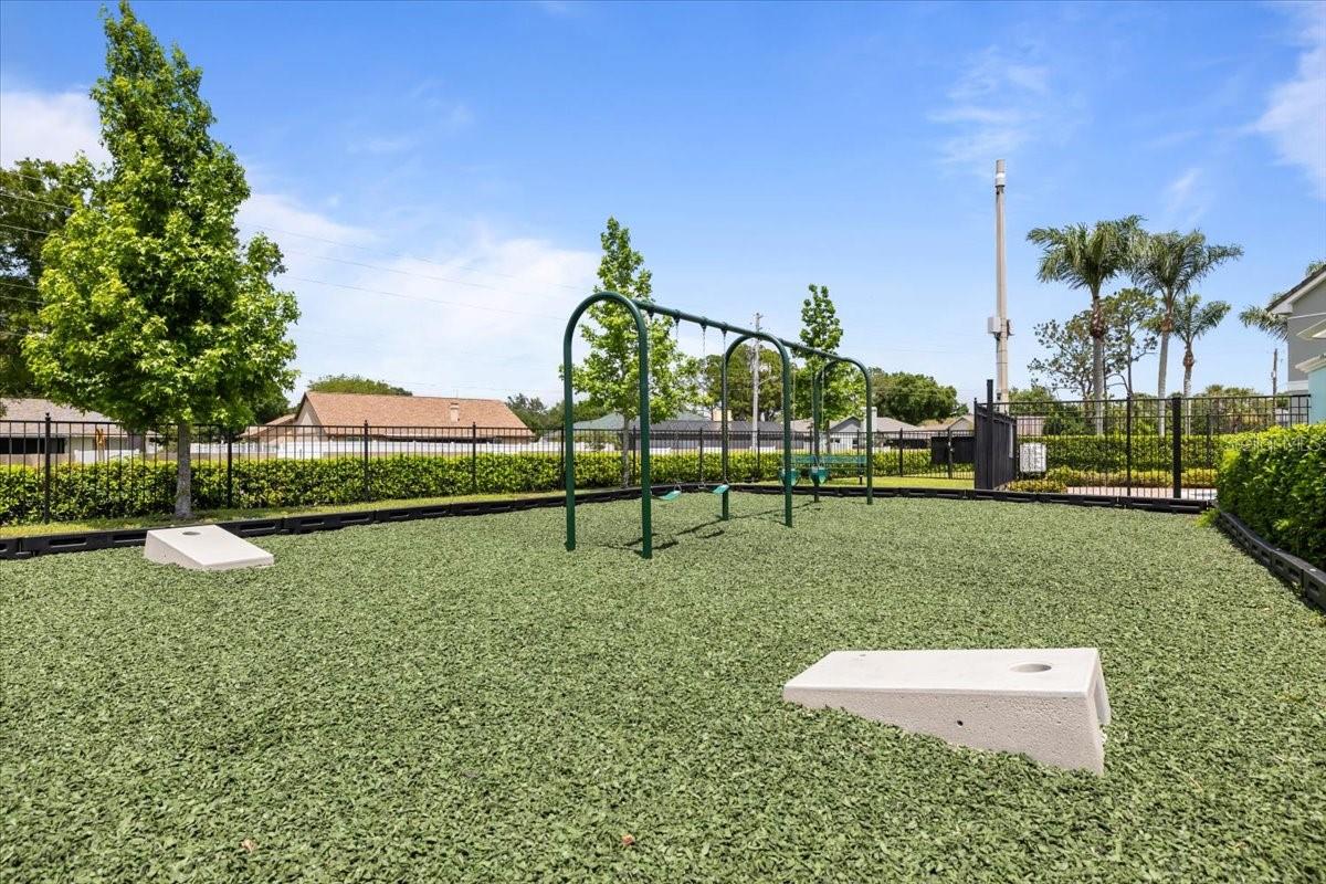 Community Corn Hole & Swings