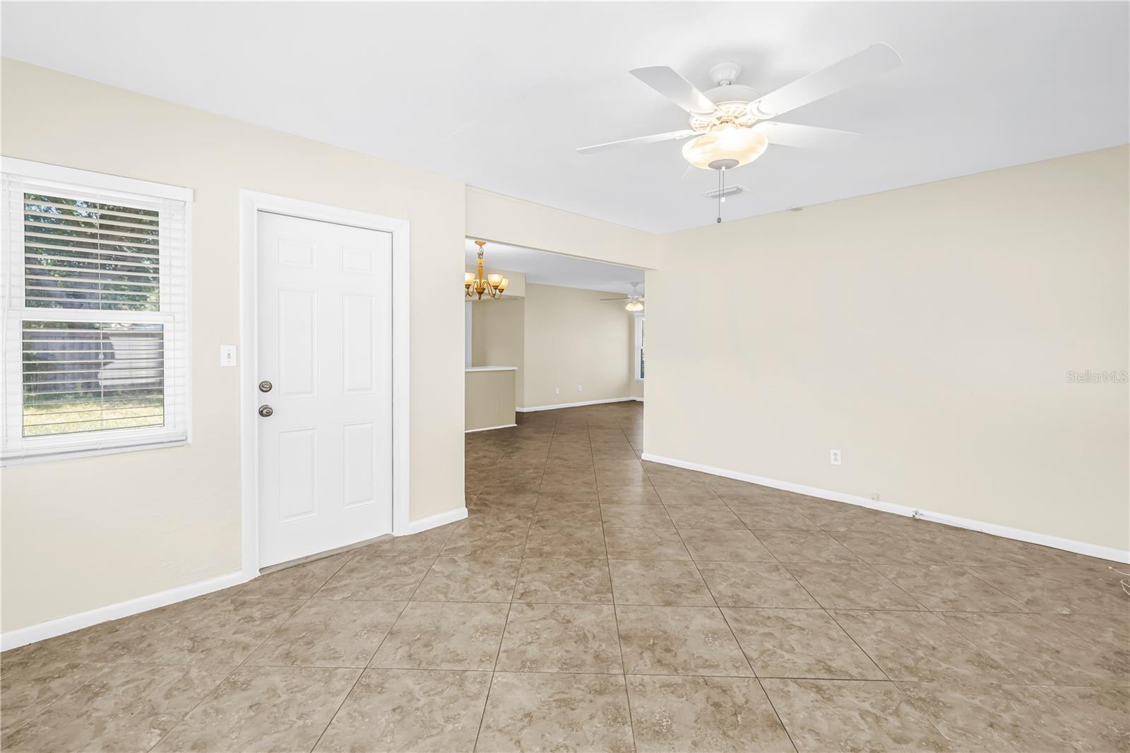 Family room with door to backyard