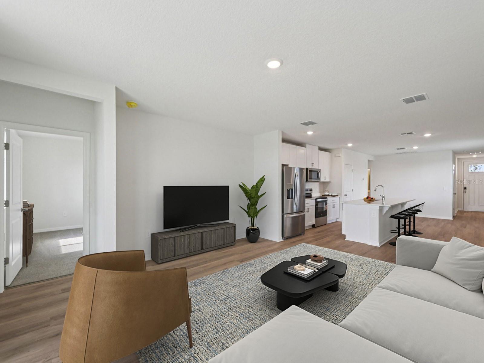 Interior photos are not of the actual home but are photos of the builder home with same floorplan with similar interior finishes and features. Photo uses virtual staging.