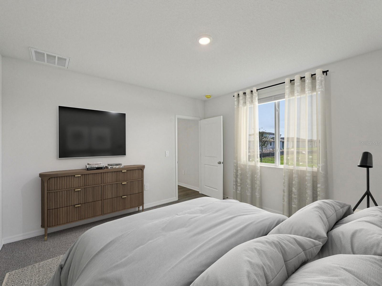 Interior photos are not of the actual home but are photos of the builder home with same floorplan with similar interior finishes and features. Photo uses virtual staging.