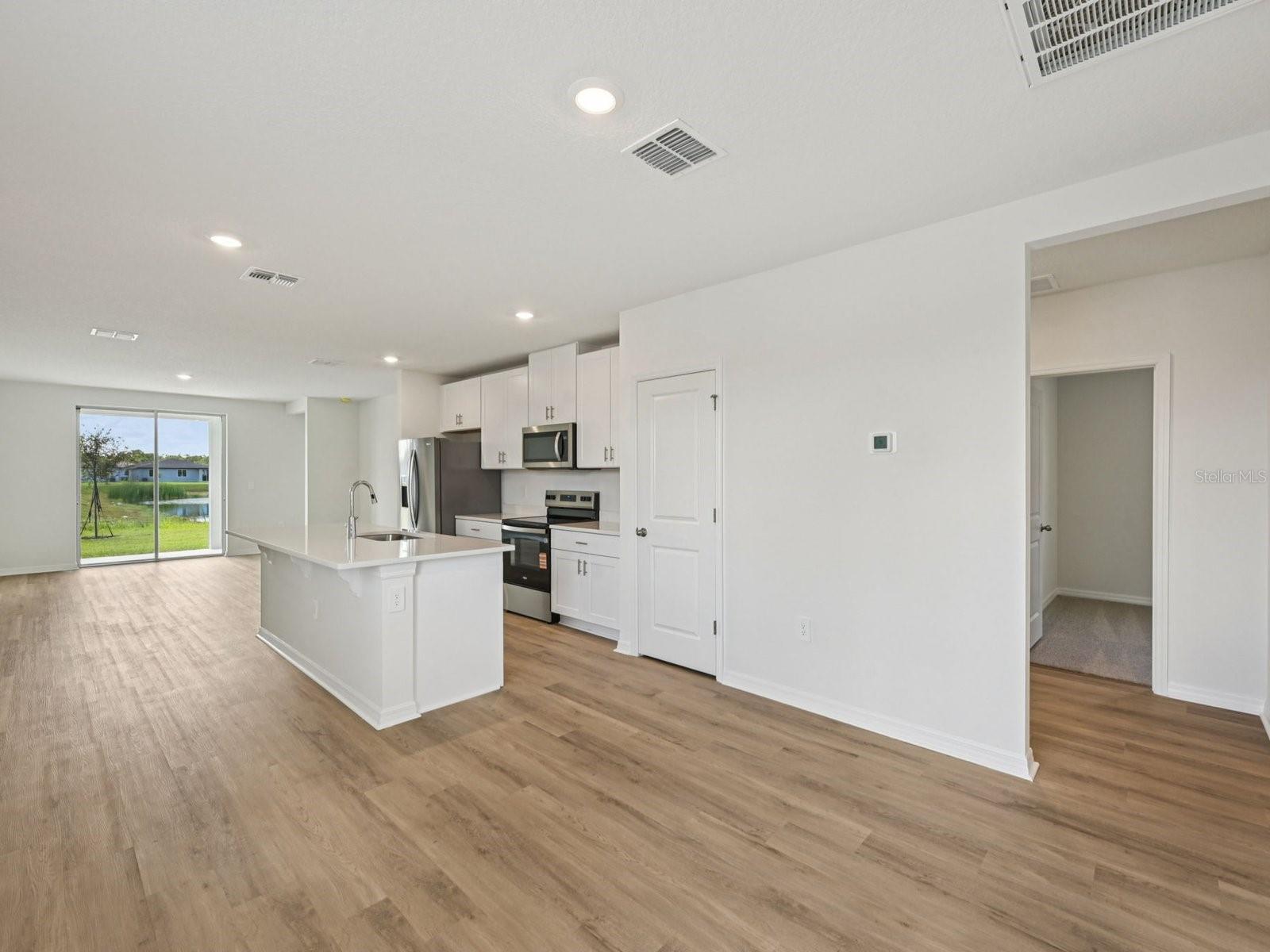 Interior photos are not of the actual home but are photos of the builder home with the same floorplan with similar interior finishes and features.