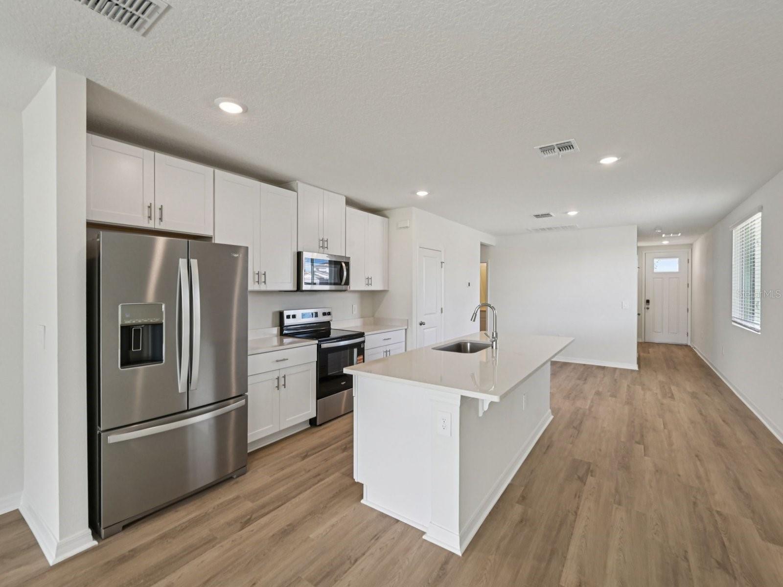 Interior photos are not of the actual home but are photos of the builder home with the same floorplan with similar interior finishes and features.
