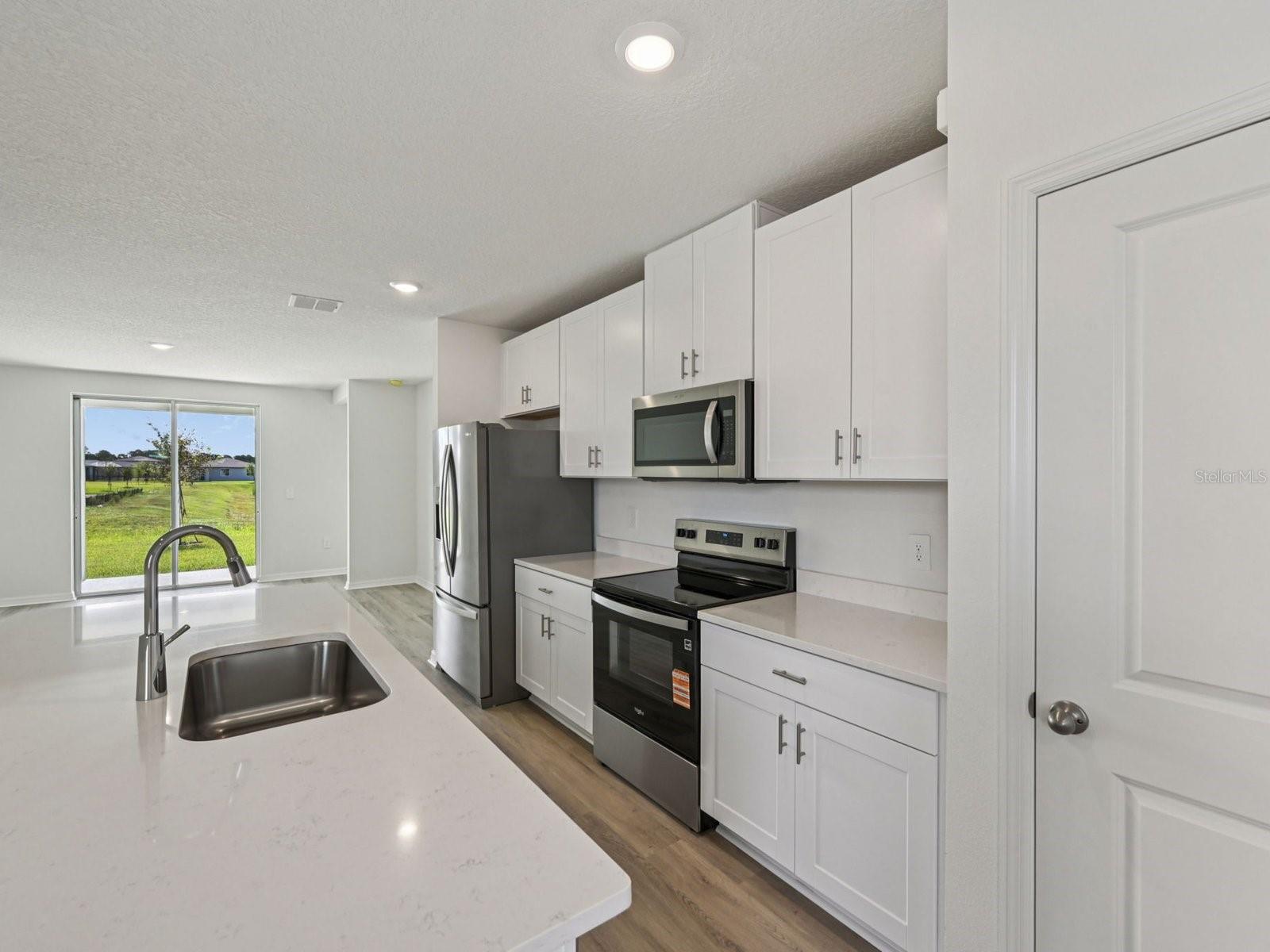 Interior photos are not of the actual home but are photos of the builder home with the same floorplan with similar interior finishes and features.