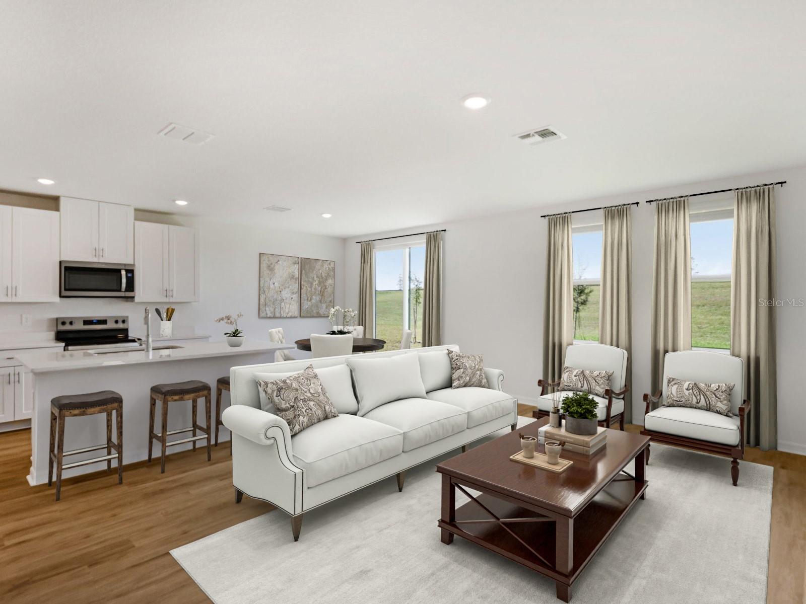Interior photos are not of the actual home but are photos of the builder home with same floorplan with similar interior finishes and features. Photo uses virtual staging.