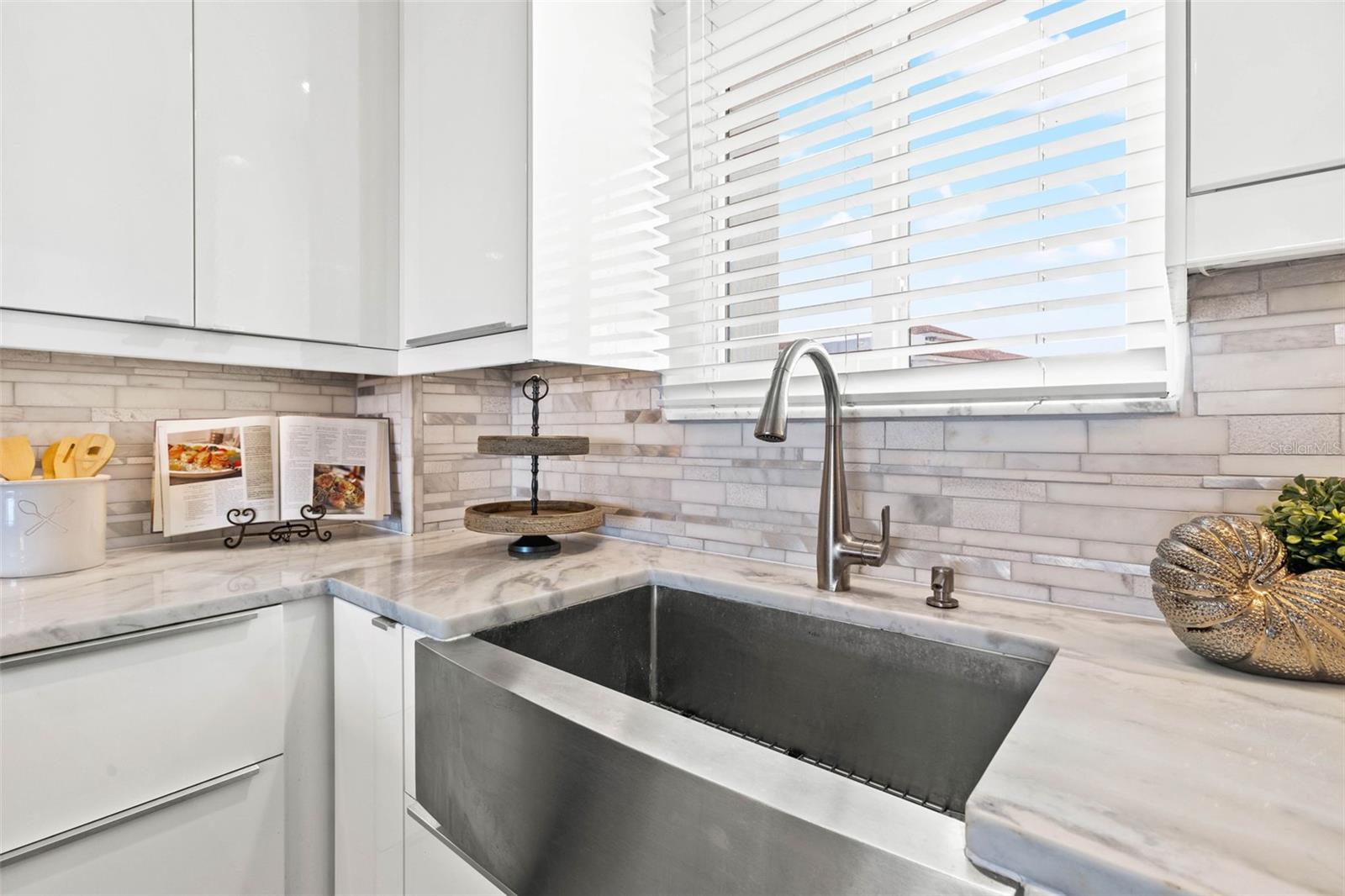 Water and sunset views from kitchen sink