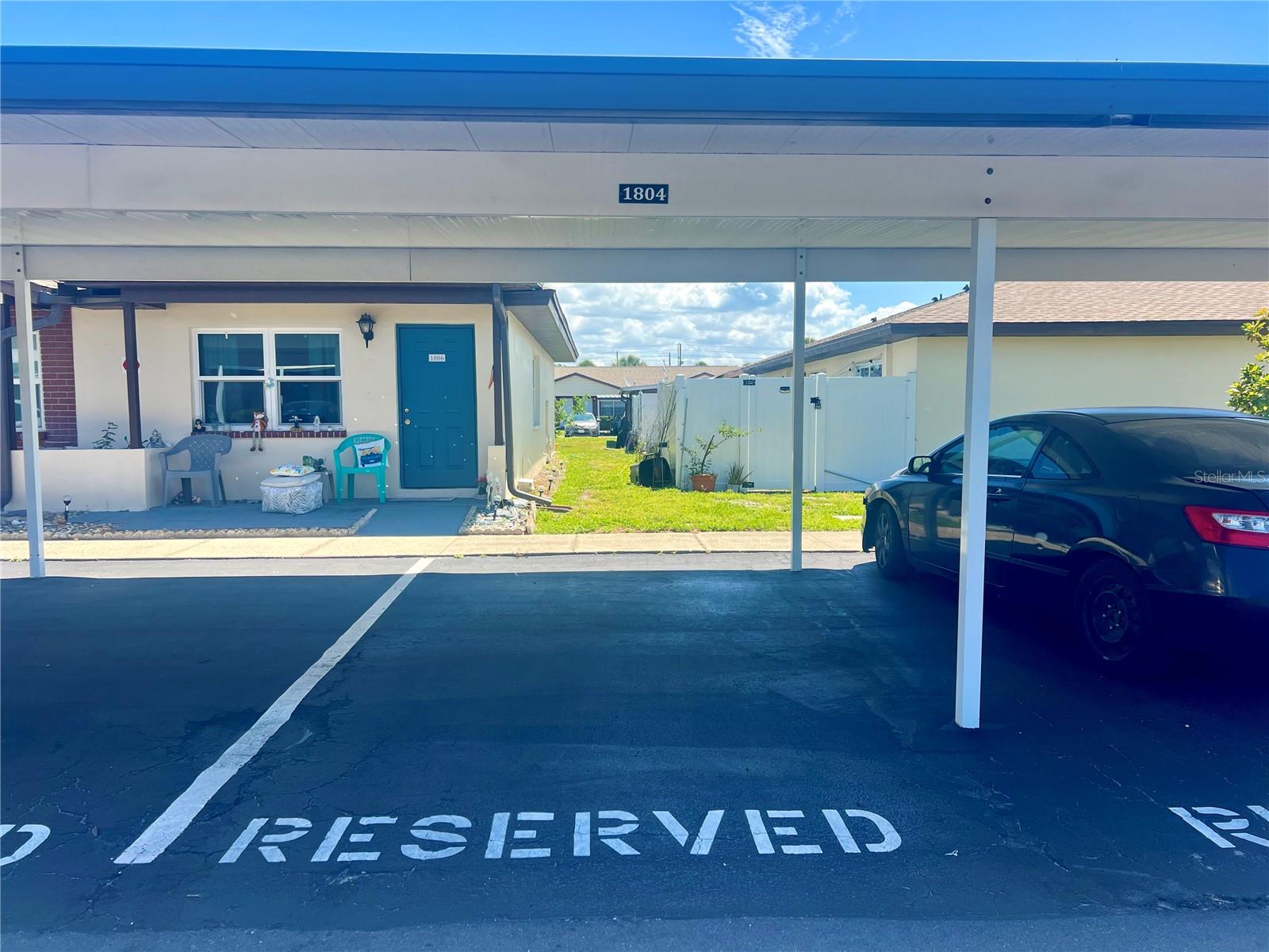 Covered parking & Visitor spot in front