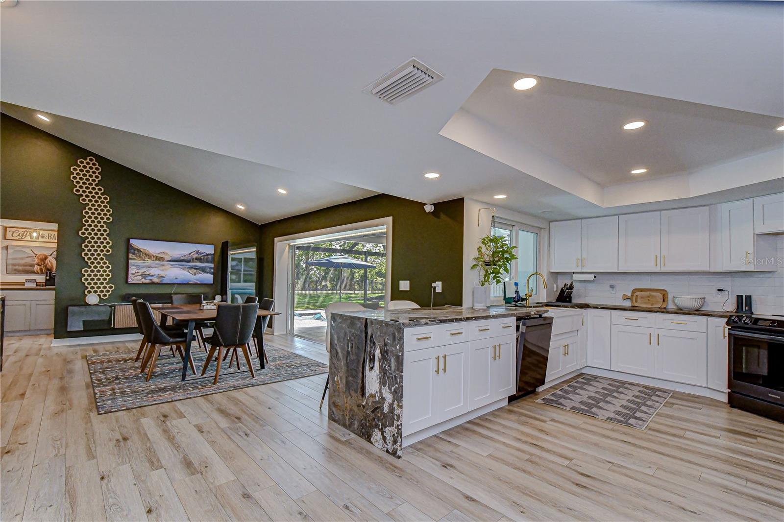 Kitchen, Family Room Sliders Open to Pool