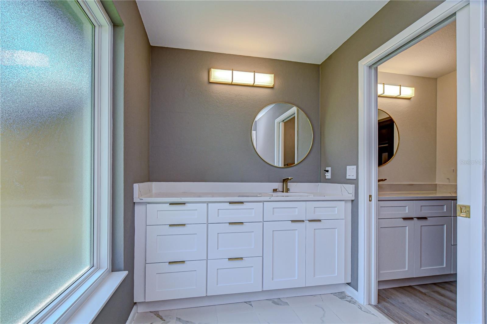 Separate Vanities - Pocket Door