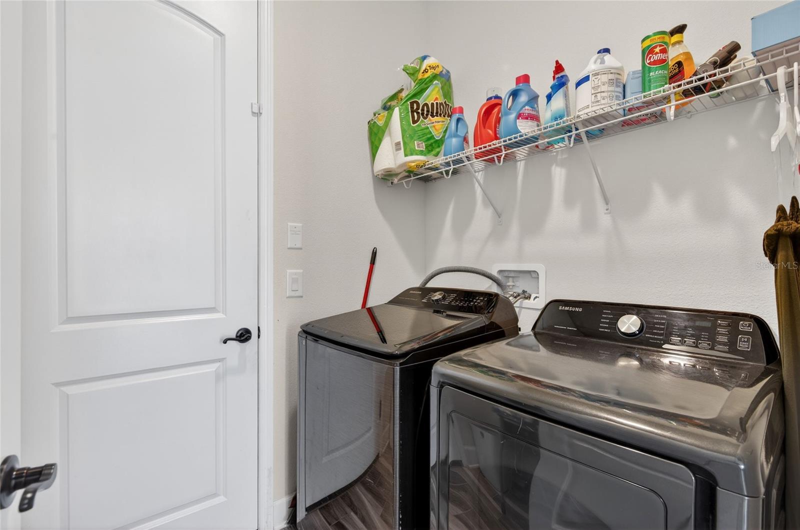 Laundry with Door to 3 Car Tandem Garage