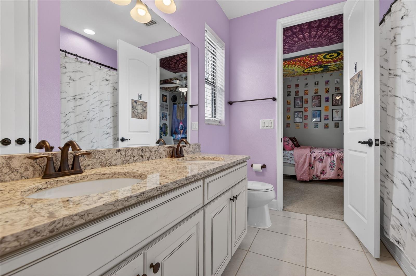 Jack and Jill Bathroom with Tub/Shower Combo