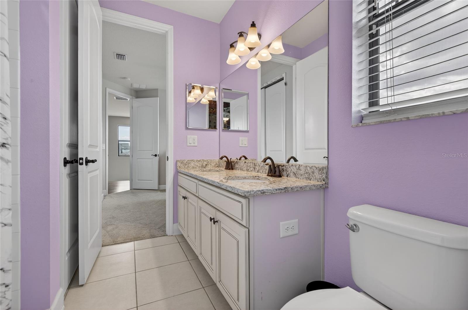 Jack and Jill Bathroom with Tub/Shower Combo