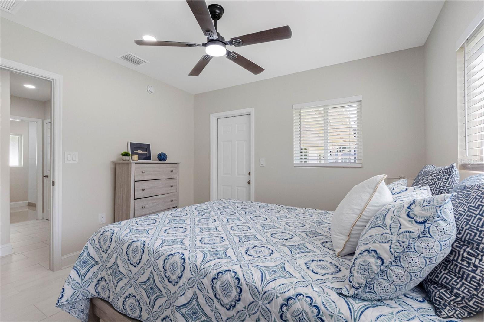 3rd bedroom with door access to front of the home