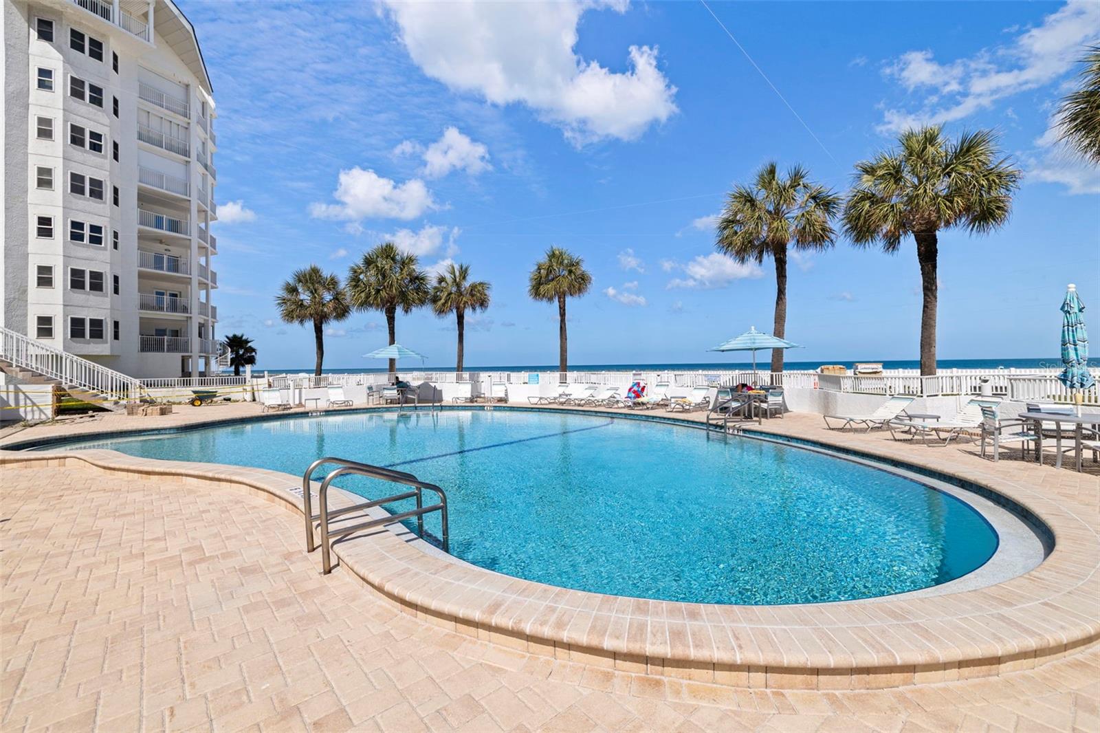 Community Pool to Relax with Direct Beach Access