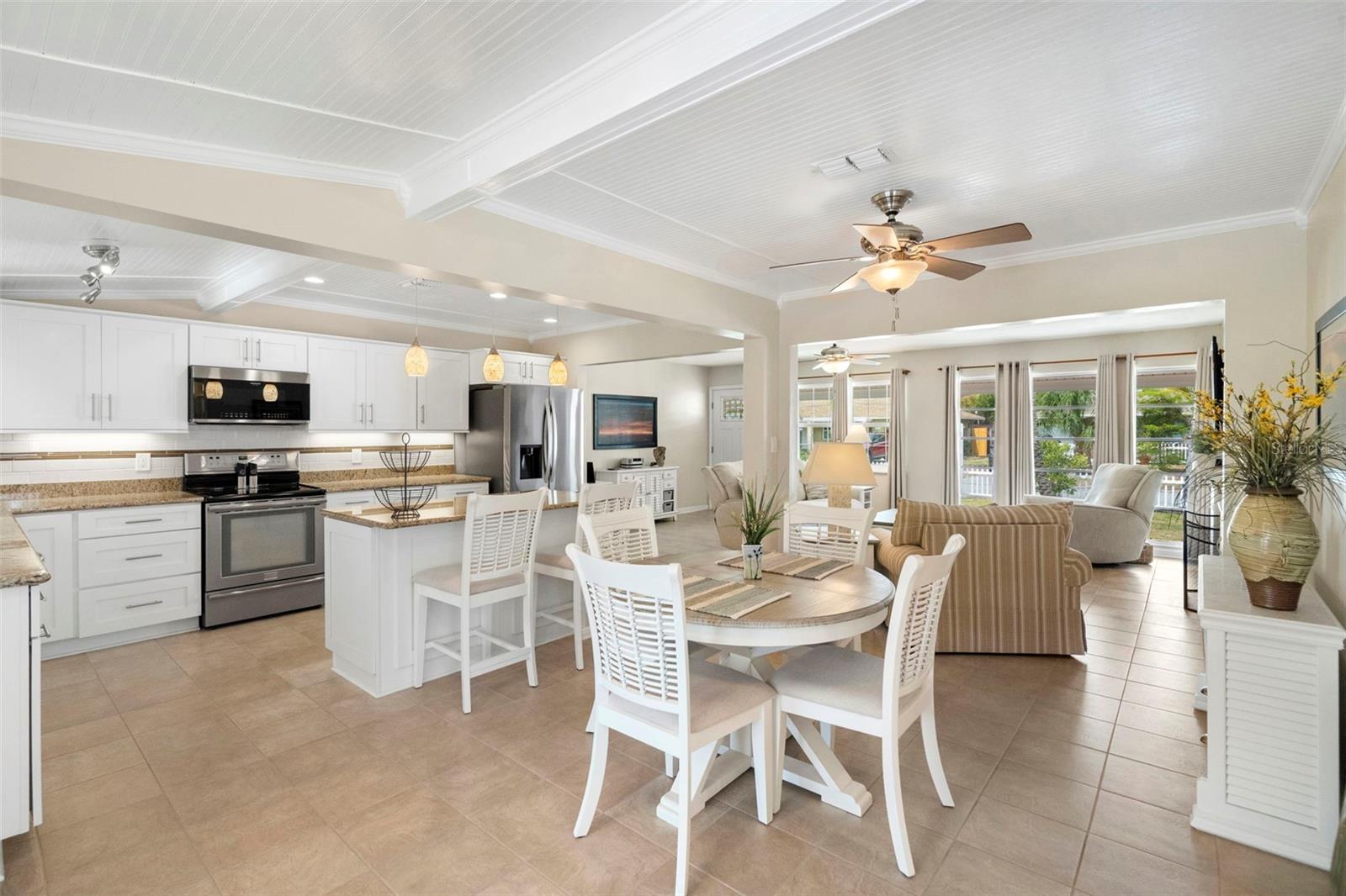 The open living and dining areas blend into an updated kitchen.