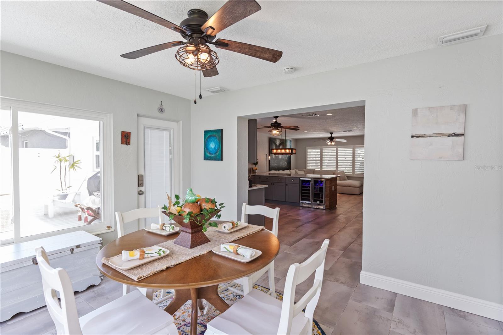 Exit the back door to the back yard/deck