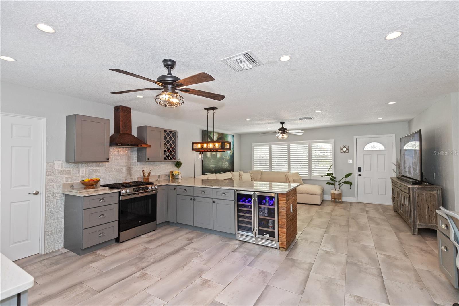 Canned lighting with dimmers in living room and kitchen