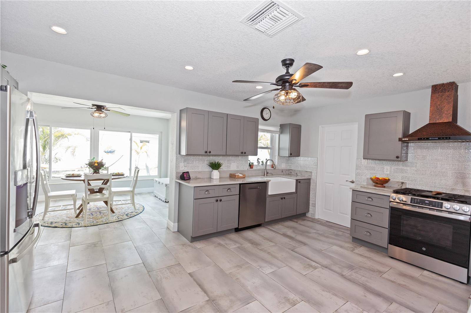 Kitchen also opens up to the dining room/flex space