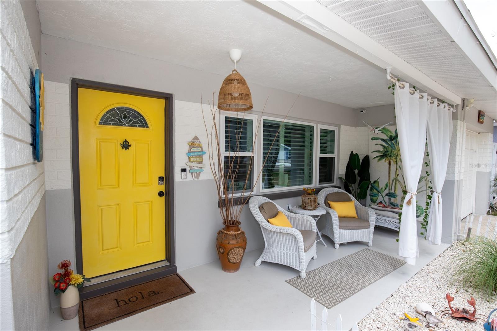 Covered porch ideal for morning coffee or evening drinks