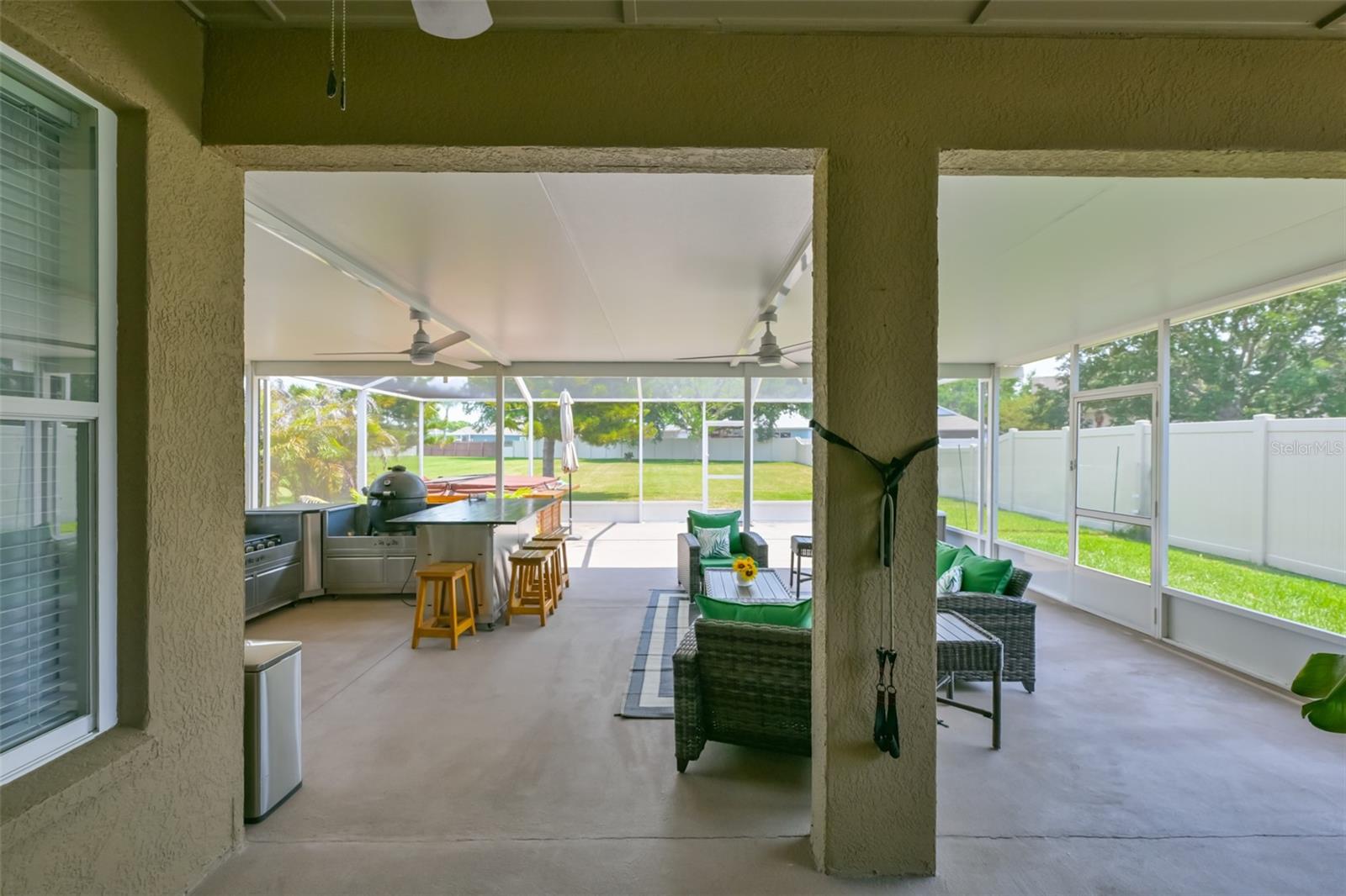Looking out the family room sliders to the 900 sq ft Lanai. More photos after the inside of the house.