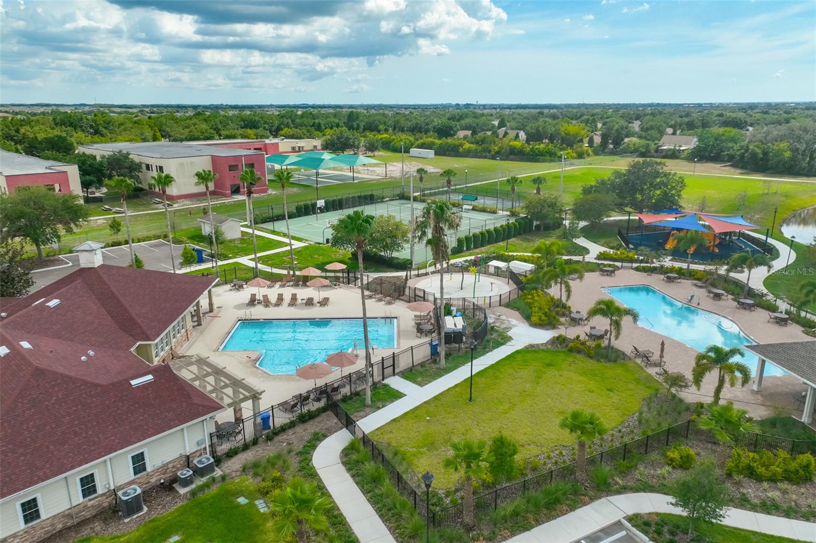 Amenities and path that runs around a large pond