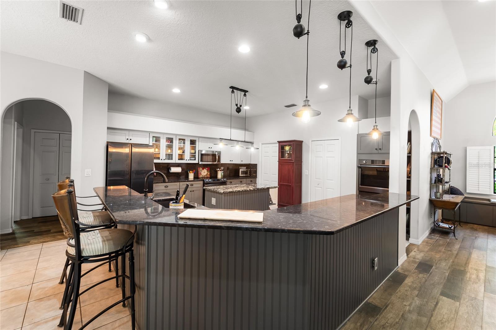 Wrap-around counter with space for 8-10 barstools