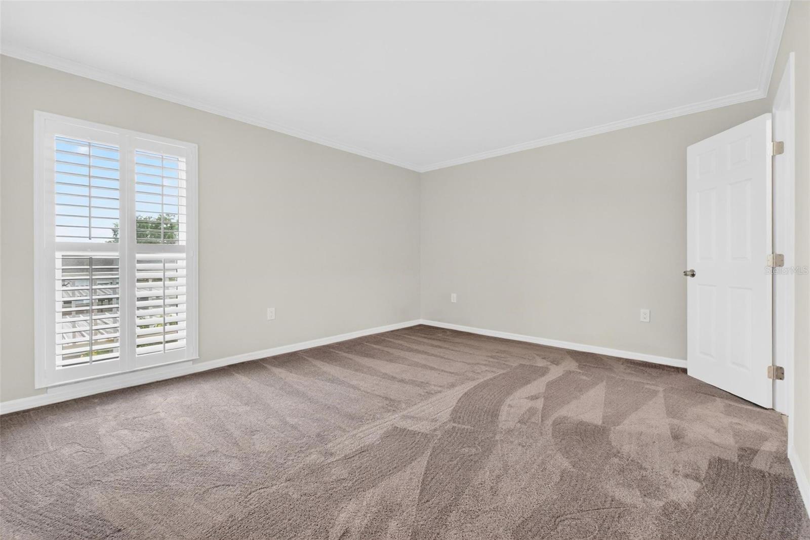 Large Primary Suite with Plantation Shudders