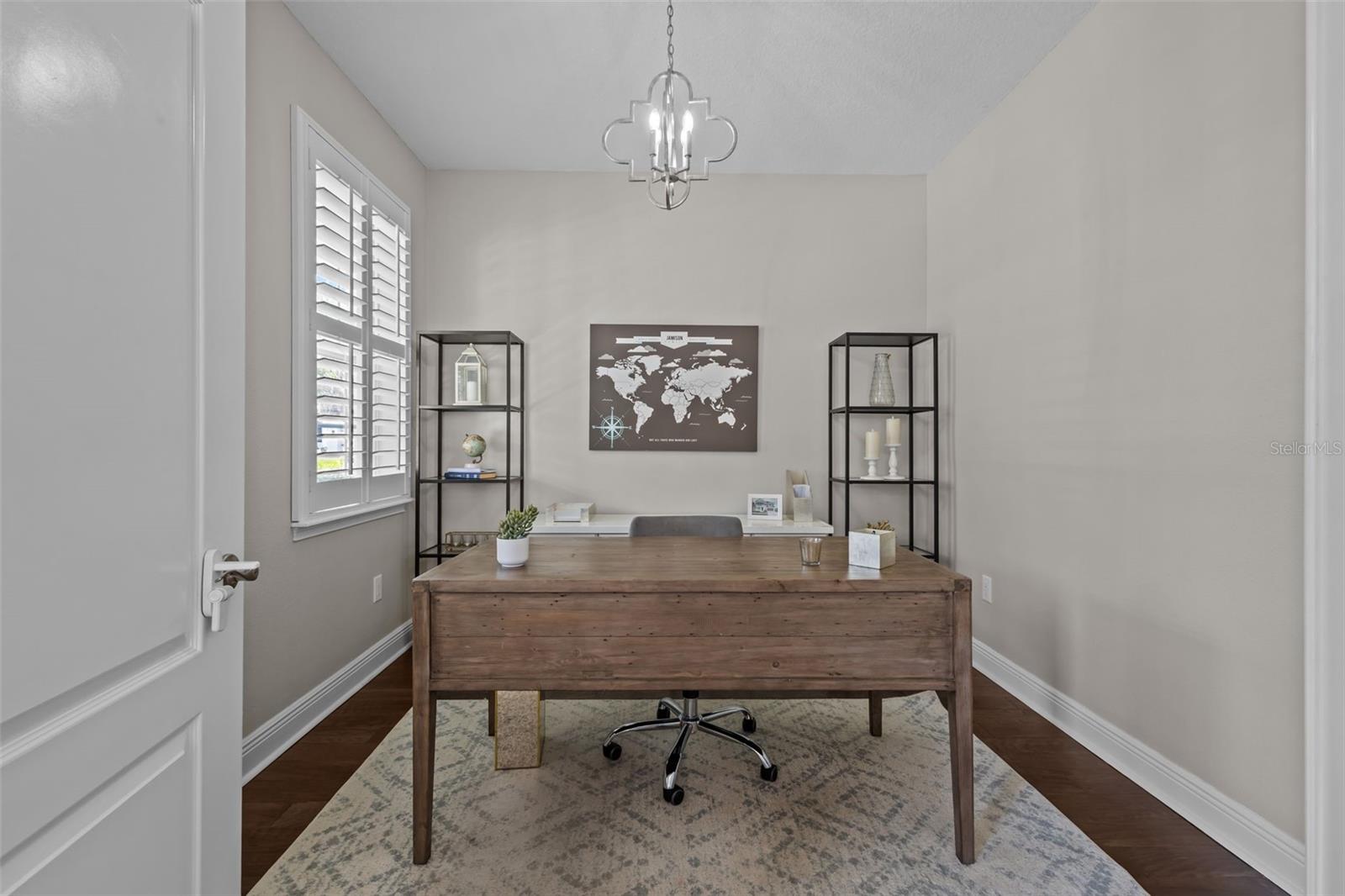Dedicated home office just off the entry, offering privacy and flexibility for work or study.