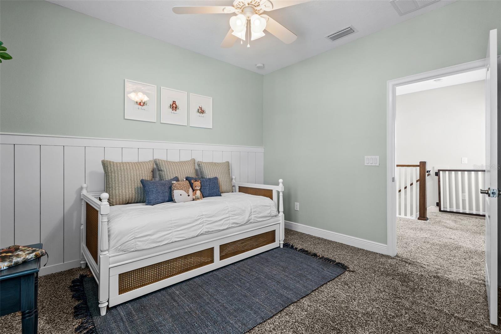 Bedroom 3 - custom woodwork with walk in closet with built ins