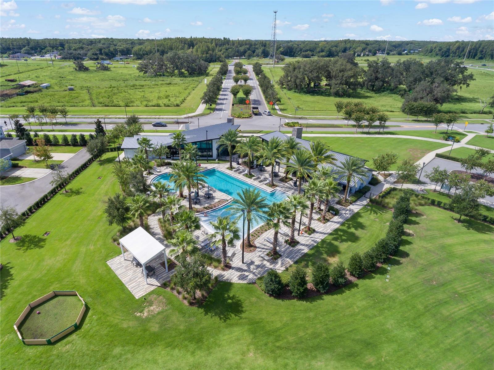 Asturia community main ammenities (left clubhouse, right gym, behind buildings is the pool)