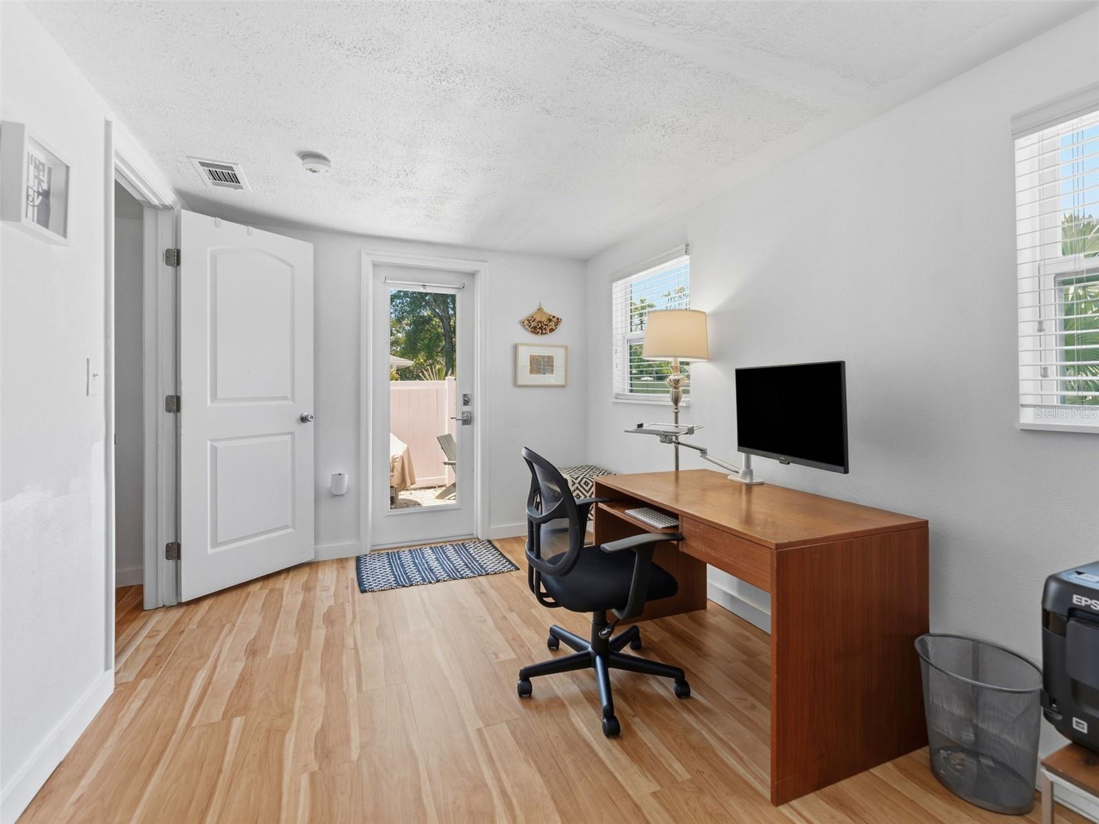 Bedroom 3 also has rear patio access