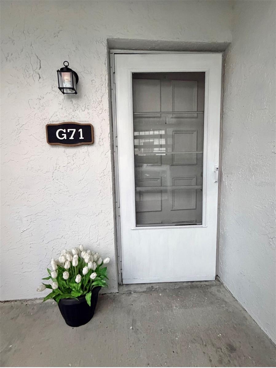 Welcome to G71....Fresh flowers have                                                                                                                                                                                                                                                                                                                                                          q been planted, and there's a storm door for extra protection and natural light or breeze when desired.