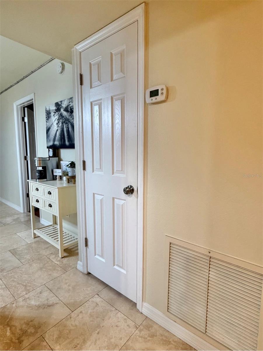 Just outside the Kitchen are two closet pantries.