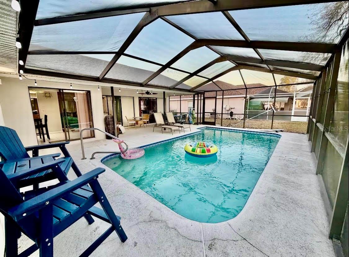 Screened in pool with lanai