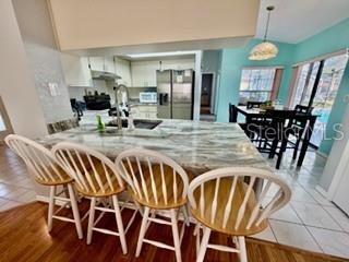 eat-in kitchen with new granite countertops